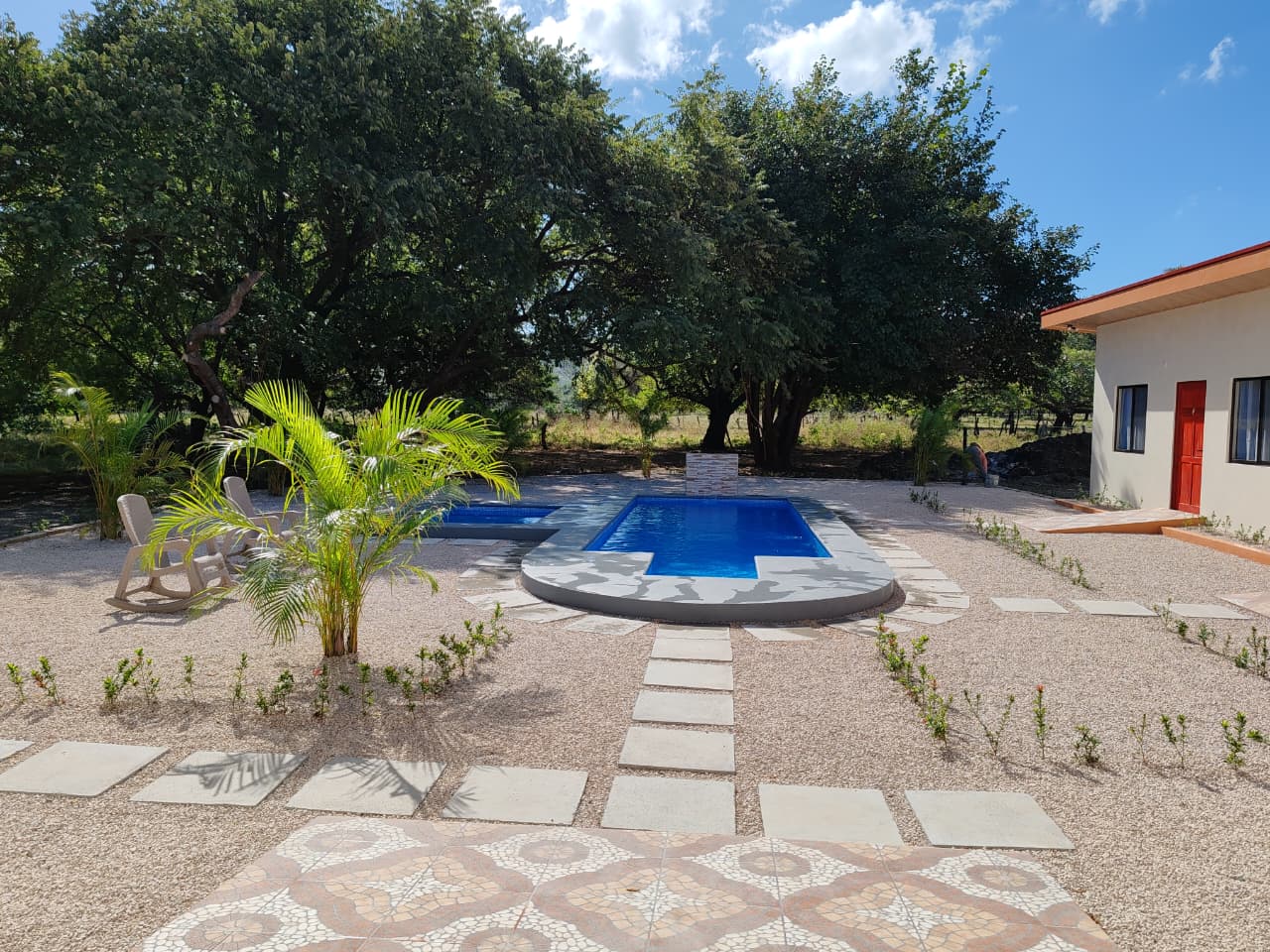 Piscina con área de chapoteo